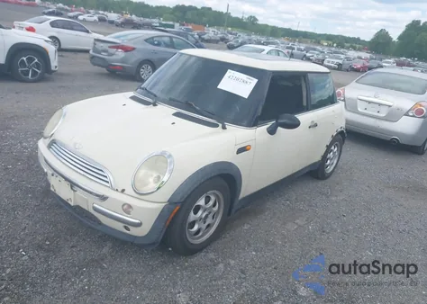 2004 Mini Cooper z USA, uszkodzony, nr VIN WMWRC33424TC53596